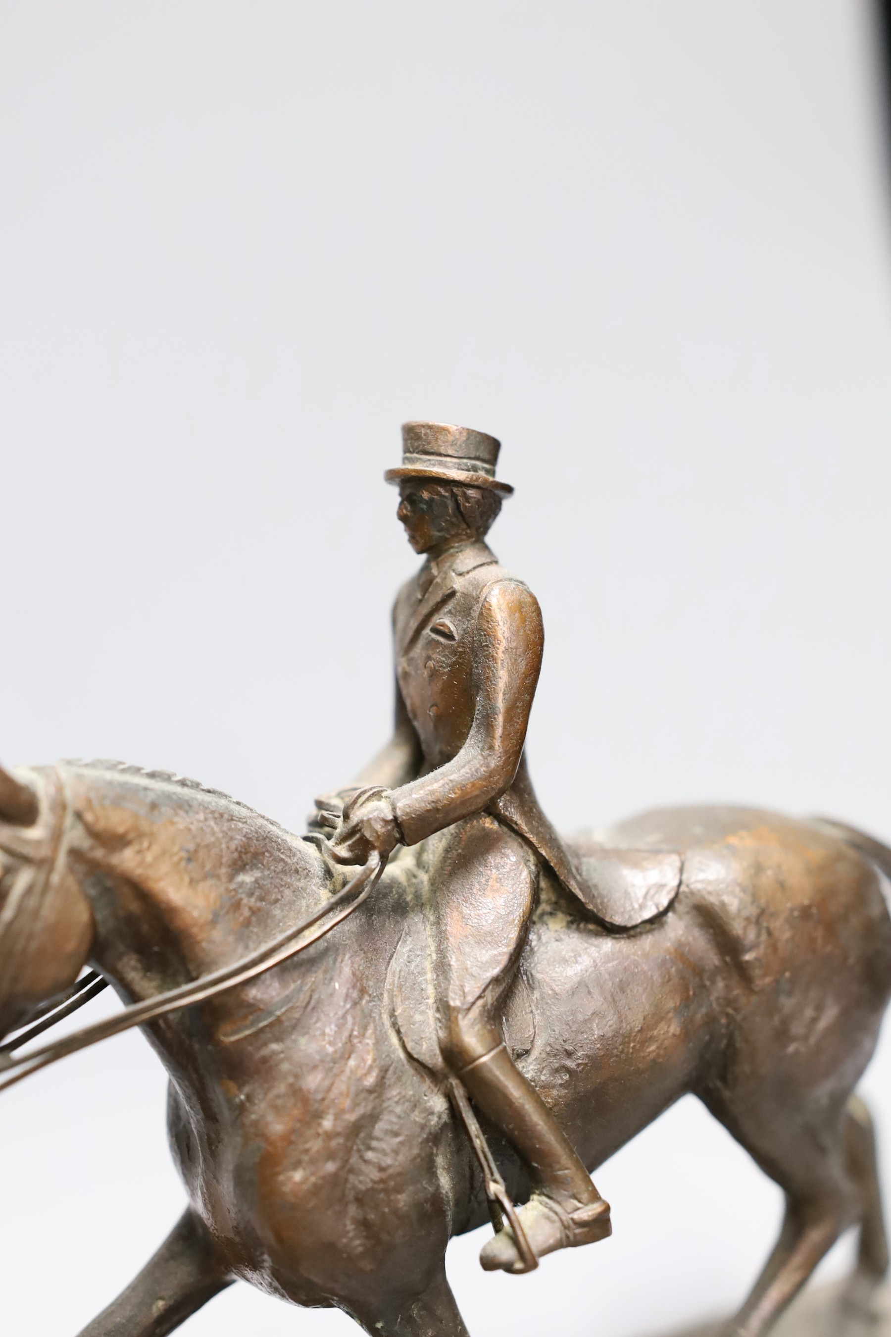 Five bronze spelter models of dressage horse and rider awarded to Domini Lawrence c.1970s, 15cm tall